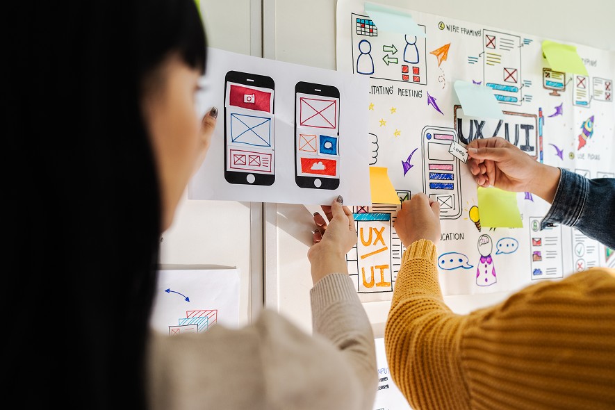 ux-developer-and-ui-designer-brainstormin-- DevUps
